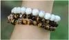 Commercio all'ingrosso 10 pz/lotto Bianco Howlite Perline di Marmo con Micro Rame Pavimentato Nero Zirconi Cz Bead Nuovo Testa di Leone Braccialetti di Perline di Fascino