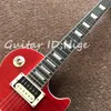 new one piece body and neck electric guiar in red color with ebody fingerboard and frets end binding , with bone nut guitarra
