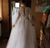 アイボリーレースアップリケ実写真ボールガウンのウェディングドレス長袖の花嫁のドレス