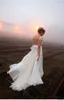 Fashionable A Line Wedding Dress Cap Sleeve V Neck Train Chiffon Bridal Gown Bohemain 3D Floral Appliques Backless Bow Vestido de Novia