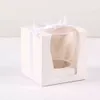 Vente en gros - Boîte cadeau Paper Craft 9 * 9 * 9cm Boîtes à cupcakes simples avec insert et ruban Bow Fournitures de mariage 12pcs1