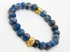 Neues Design, hochwertiger Schmuck, 8 mm große blaue Meeressediment-Steinperle mit bronzefarbenem Gold- und Silber-Totenkopf-Armband