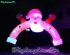 Outdoor Christmas Arch Lighting Inflatable Santa Archway 6m RGB Air Blown Santa Door With Custom Printing For Entrance Decoration