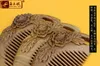 Factory wholesale angle wood Jiao natural green sandalwood comb carved peony high-grade wooden comb hair whole massage