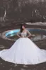 Stunning Crystals Wedding Dress Ball Gown Sheer Jewel Neckline Long Sleeves Beaded Top Tulle Bridal Gowns Lace Appliques Hem