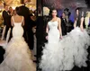 Elegant Kim Kardashian Mermaid Luxury Bröllopsklänningar Tåg Lång Spaghetti Sexig Organza Konturerad Golvlängd Bröllopsklänning för brud