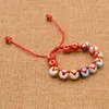 Bracelet porte-bonheur réglable en perles de crème, fait à la main, argent porte-bonheur, chat, chaîne rouge, 351B