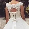 Wspaniaczny kraj koronkowy suknia balowa w rozmiarze plus sukienki ślubne koronkowe do dziurki od klucza tylne rękawy Bow Long Boho Bridal Suknia fabryczna C7850762