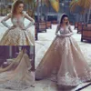 2018 Vestidos de novia de lujo con diamantes de imitación de Dubai con tren desmontable Escote de ilusión Vestido de novia de manga larga Precioso vestido de novia de sirena