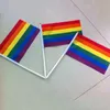 50 pz/pacco 14*21 cm gay pride Piccola bandiera nazionale arcobaleno mano sventolando bandiere Con Pennoni In Plastica Per La Decorazione Parata Sportiva