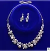 2019 neue koreanische Art-Brautschmucksache-Halsketten-Ohrclip-Ohrring-gesetzte Mädchen-Abschlussball-Cocktailparty-Abendrhinestone-Perlen auf Lager billig 1106