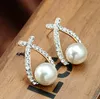 スタッドイヤリング卸売ゴールドクリスタルスタッドイヤリングBrincos Perle Pendientes Bou Pearl Pearings