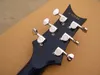 En ny helt elektrisk gitarr Se genom Blue Left Hand Musical Instrument8236097