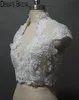 2017 Bridal Wedding Jacket with Keyhole Back High collar Vneck Capped Sleeve Lace Appliques Handmade Flowers Pearls Buttons Weddi4609200
