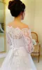 Lace Bröllopsklänningar utan slöja Bateau Illusion Långärmad Bröllopsklänning Sweep Train Back Covered Button Sash Ribbon Brudklänningar
