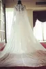 Abiti da sposa musulmani Dubai dell'Arabia Saudita con mantello avvolgente Abiti da sposa in pizzo robe de mariage Abiti da sposa con paillettes applicati