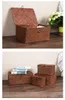 Europeu criativa Veja grama de palha Handmade Cesta tecida com tampa Rattan Box caixa de armazenamento Sundries Titular Home Decor