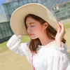 Wide brim sun hat with pom pom sun protection straw beach caps 3 colors available free shipping