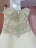 Klänningar älskling pärlstav kristaller rygglösa eleganta brudklänningar med spaghettiremmar nya saudiarabiska aline baskiska midja bröllopsklänning