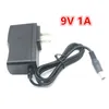 Transformadores de iluminação AC 100-240V para para DC 9V 1A 1000mA 1000mA Alimentação Adaptador Carregador UE / EUA / UK / Au Plug