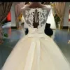 Juvel illusion halsringning applikationer eleganta brudklänningar skräddarsydd domstolståg vackra bollklänningar ärmlös tyll bröllopsklänning296y