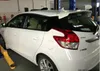 Spedizione gratuita! Materiale ABS più resistente di alta qualità con spoiler alettone posteriore con vernice colorata, Empennage per Toyota Yaris 2009-2015