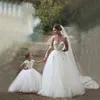 Mère mère et fille Flower Girls Robes pour les mariages en dentelle blanche ivoire tulle princesse arabe pour enfants