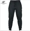 Herrbyxor Partihandel - Kriminalitet Män Slimming Flannelette Leisure Hip-Hop Design Sweatpants Male Joggers Kläder European Size S-XXL1