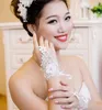 Moins cher 2019 nouveau Style strass dentelle courte gants de mariée gants de mariage sans doigts blanc ivoire en Stock3293294