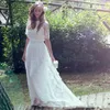 Bohemian Fairy Lace Wedding Dress Jewel Half Sleeves Long Sheer Modest Country Sweep Traad Beach Moderskap Brudklänningar