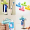 New Fashion Creative Rolling Squeezer Toothpaste Dispenser Tube Partner Sucker Hanging Holde distributeur dentifrice 5 Colors