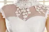 Abiti da sposa con collo alto scintillante Abiti da sposa Principessa Maniche ad aletta trasparenti Cristalli Applicazioni in pizzo Abiti da sposa con corsetto in tulle con paillettes