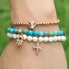 Vente en gros de bijoux pour femmes Micro Inlay Zircons Fatima Hand Hamsa Cz Bracelets avec 6mm Light Blue Sea Sediment Imperial Stone