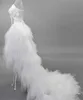 Krótkie z przodu długie sukienki ślubne Nowe projekty kryształy marszki piórowe tiul wysokie niskie suknie ślubne vestido de noiva real po 2833