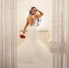 Gorgeous Illusion Back Mermaid Wedding Dress Plus Size Spaghetti Straps Lace Appliques Puffy Tulle Skirt Arabic Bridal Gowns Sleeveless