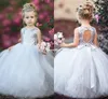 2019 Modest Silberne Paillette Blumen-Mädchen kleidet Puffy Tüll mit Schärpen Ballkleid der Prinzessin-Style Kinder-Festzug-Kleid Erstkommunion Kleider