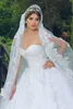 Białe koronkowe suknie balowe suknie ślubne kochanie eleganckie z koraliki 3 D kwiat niestandardowy Seksowne suknie ślubne