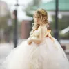 結婚式のシャンパンビーズのページェントのドレス女の子の手作りの花拝領のガレスのための7歳のボールガウンチュールの花の女の子のドレス