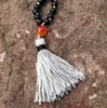 ST0186 108 Collana di perle di mala Collana lunga con nappa Collana di pietra di onice nero opaco annodato Collane di rosario fantasia250F