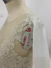 진짜 아이보리 샴페인 깎아 지른 웨딩 드레스 환상 탑 슬리브리스 실버 레이스 Appiques 코르셋 뒤로 쉬폰 신부 가운 분할과 기차로