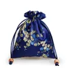 Tjockna körsbärsblommor Små presentpåse Drawstring Silk Brocade Smycken Makeup Verktyg Förvaring Påse Candy Tea Favor Bags Cloth Packaging