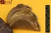 Factory wholesale angle wood Jiao natural green sandalwood comb carved peony high-grade wooden comb hair whole massage