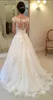 2019 Modest New Lace Appliques Wedding Dresses A line Sheer Bateau Neckline See Through Button Back Bridal Gown Cap Sleeves