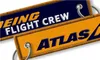 Atlas Airlines Boeing Flight Crew Bagages Étiquettes brodées Prix usine Porte-clés Porte-clés en tissu 13x2.8cm 100pcs / lot