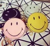 Wholesale- Lovely Cartoon Small Coin Purse Women's Purse Smiling Face Pill Eye Interesting Tassels Bag Pendant Girls Leather Wallet