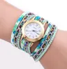 10 pçs / lote senhoras pulseira relógios casuais pulseira de couro faixa colorida Rhinestone Diamond Rivet Mulheres Quartz WristWatch Atacado