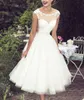 Teelange 1950er-Jahre-Vintage-Hochzeitskleider mit Flügelärmeln, Juwelenausschnitt, Spitze, Tüll, A-Linie, kurze klassische Brautkleider nach Maß271k