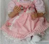 Corpo in stoffa da 22 pollici Morbido vinile in silicone Reborn Baby Doll Giocattolo di moda realistico Regalo di Natale e compleanno per bambini