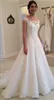 2019 Skromne nowe koronkowe aplikacje ślubne Suknie ślubne Linia Sheer Bateau Dekoll zobacz Button Back Bridal Stun Cap Sleeves259c