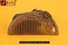 Factory wholesale angle wood Jiao natural green sandalwood comb carved peony high-grade wooden comb hair whole massage